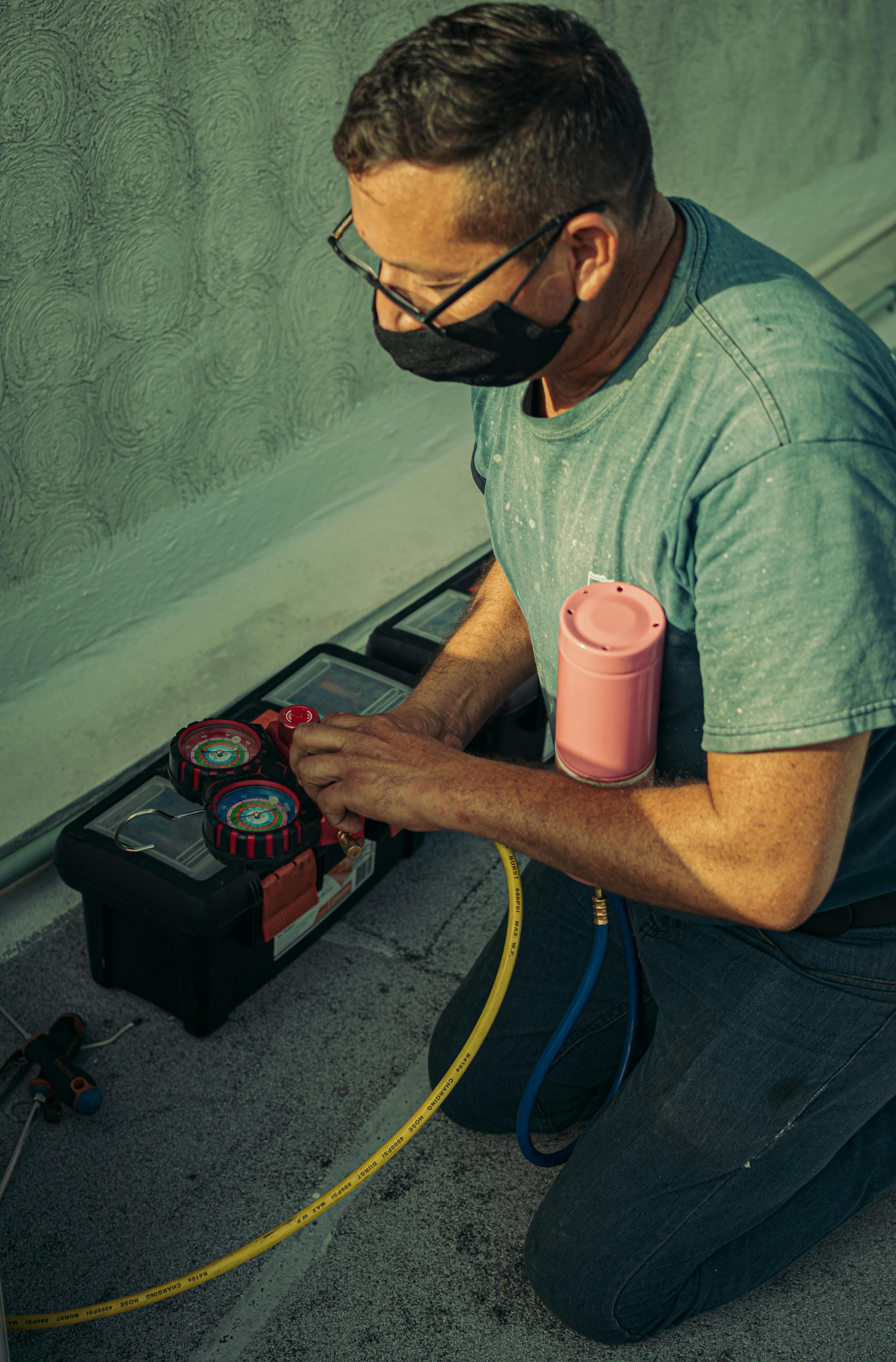 Professional HVAC technician performing air duct cleaning service in Sunnyvale